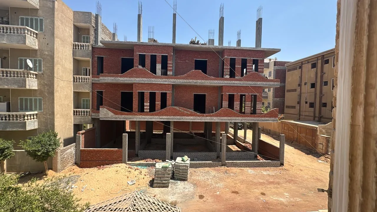 عمارة للبيع ناصية شارع أمام بنك الإسكان والتعمير